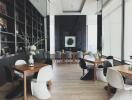 Modern dining area with wooden tables and designer chairs