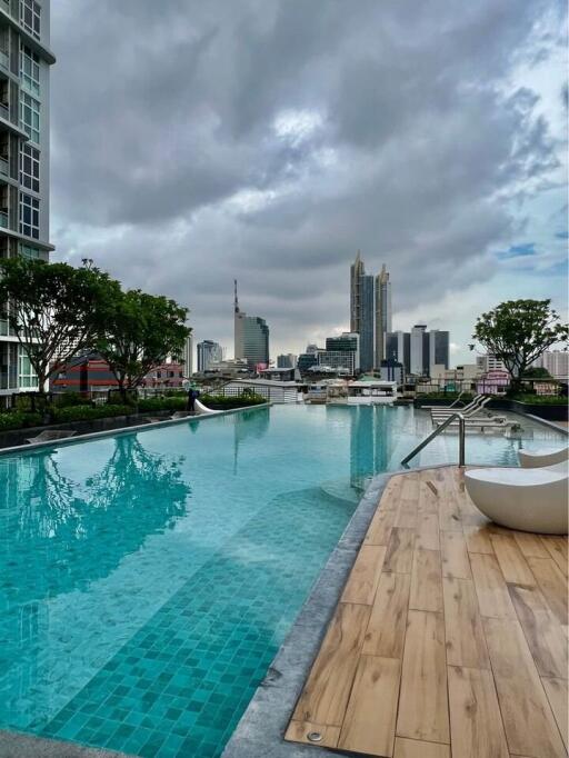 Rooftop pool with city skyline view