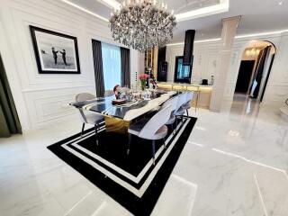 Luxury dining room with modern decor and chandelier