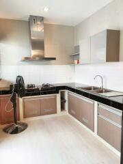 Modern kitchen with sleek cabinetry and appliances