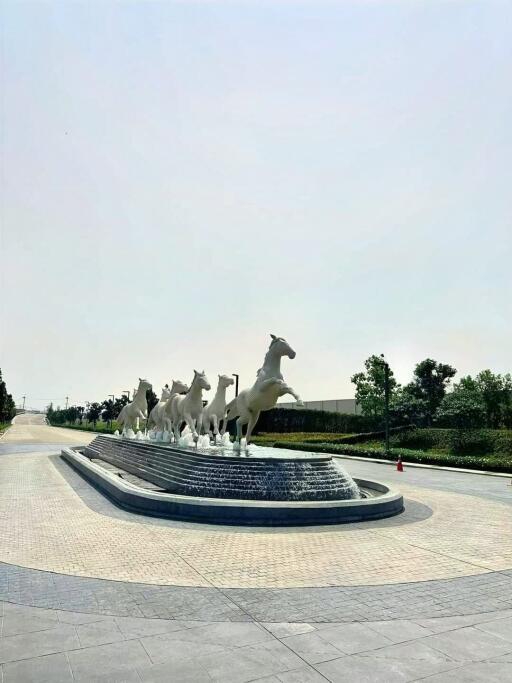 Outdoor view with horse sculptures