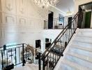 Elegant staircase with chandelier in a luxurious home