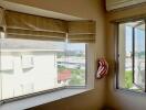 Corner window view in bedroom with air conditioning