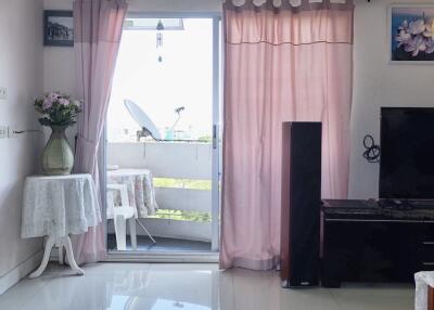 Living room with glass door to balcony