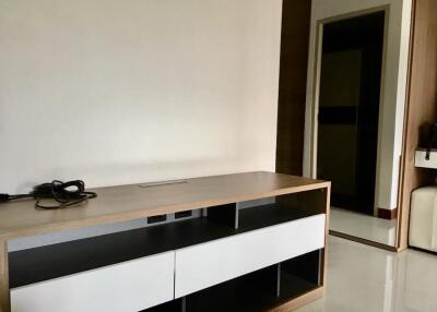 Minimalist living area with modern TV stand