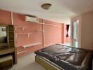 Bedroom with shelves and an air conditioner