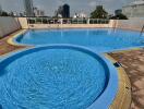 Swimming pool with city skyline view