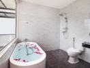 Spacious bathroom with bathtub and shower