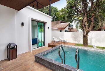 Modern outdoor area with pool and seating