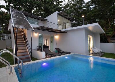 Modern house with pool and outdoor seating