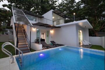 Modern house with pool and outdoor seating