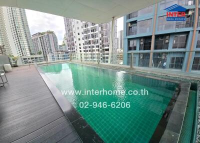 Modern pool with city view