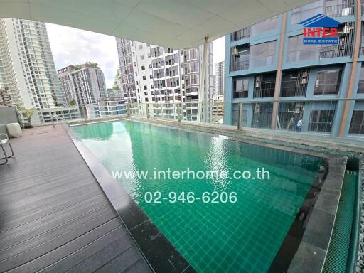 Modern pool with city view