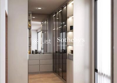 Modern hallway with wooden flooring and built-in cabinets