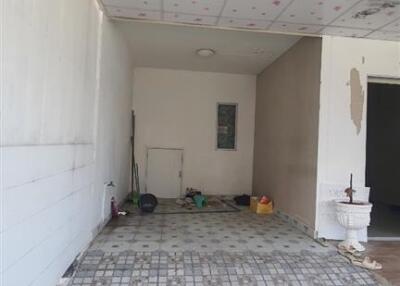 Empty room with decorated ceiling and tiled floor