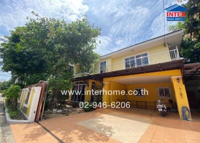 Front view of a residential property with a carport