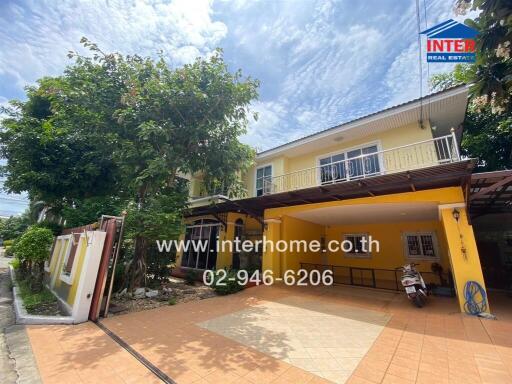 Front view of a residential property with a carport