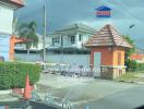 Entrance gate of a residential property with a guardhouse