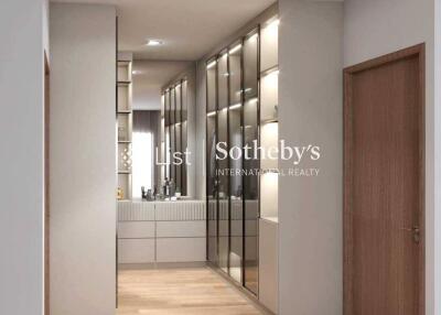 Modern hallway with wooden flooring and built-in storage