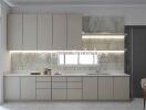 Modern kitchen with beige cabinetry and marble backsplash