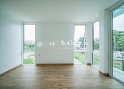 Bright and spacious living room with large windows