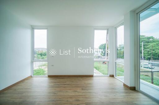 Bright and spacious living room with large windows