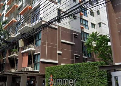 Exterior view of a modern residential building named Summer Garden