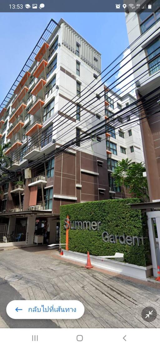 Exterior view of a modern residential building named Summer Garden