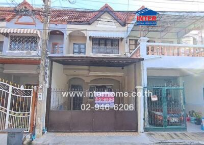 Two-story residential building with a garage