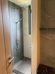 Modern bathroom with glass shower enclosure