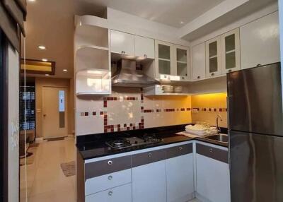 Modern kitchen with stainless steel appliances