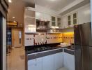 Modern kitchen with stainless steel appliances