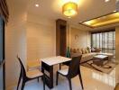 Modern living and dining area with ample natural light