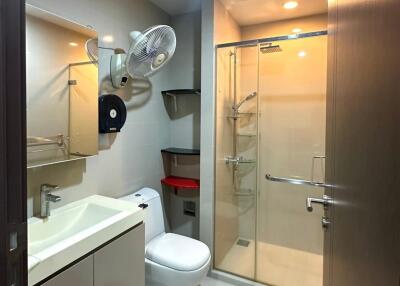 Modern bathroom with glass shower and vanity