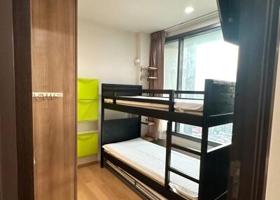 Bedroom with bunk bed and storage