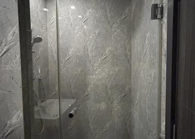 Modern bathroom with glass shower enclosure