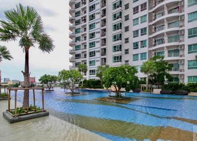 Modern apartment building with swimming pool