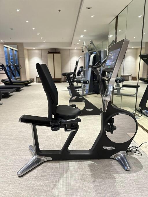 Modern gym with various exercise equipment