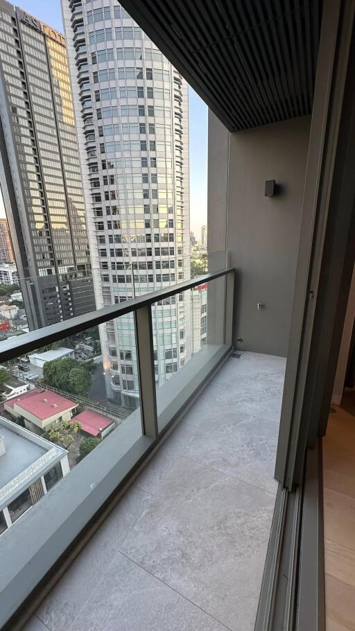 Balcony with city view and modern glass railing