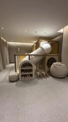 Indoor playroom with slide and toys