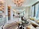 Luxurious living area with polished furnishings and a well-lit dining space