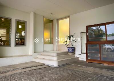 Entrance of a building with steps and glass doors