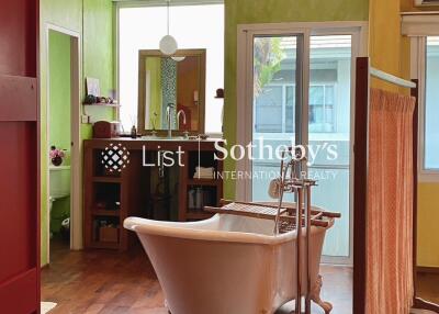 Vintage-style bathroom with clawfoot tub