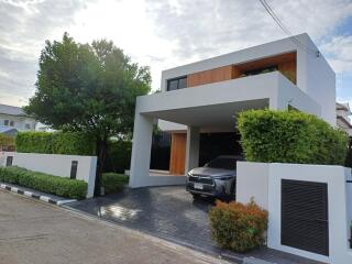 Modern house exterior with carport