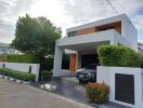 Modern house exterior with carport