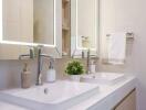 Modern bathroom with dual sinks and mirrors