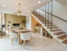 Modern living and dining area with staircase