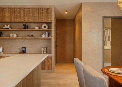 Modern living area with built-in shelving and dining table