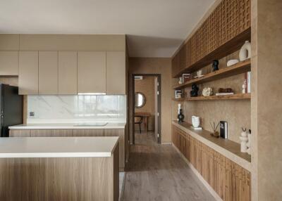 Modern kitchen with beige cabinets and open shelving