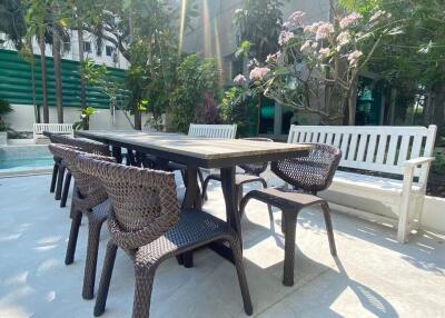 Outdoor patio with table and chairs